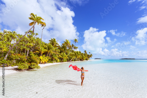 Woman with sarong on a tropical beach, One Foot Island, Aitutaki, Cook Islands photo