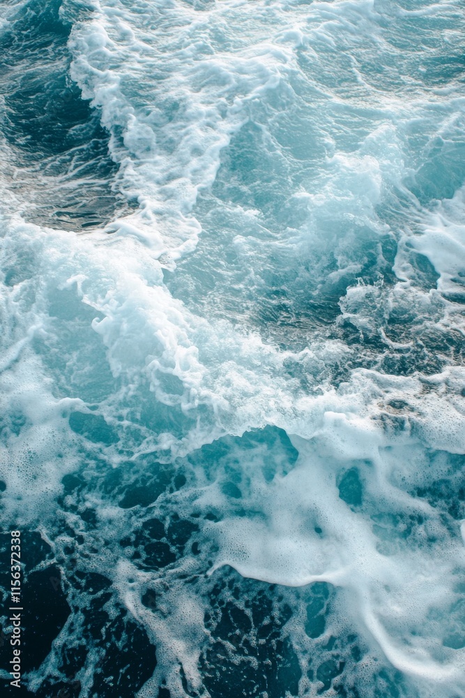 Fototapeta premium The image is of a large body of water with waves crashing against the shore. The water is a deep blue color, and the waves are high and powerful. Scene is one of strength and power