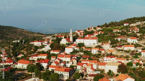 Nerezisca Village Settlements And Church In Brac Island, Croatia. - aerial shot photo