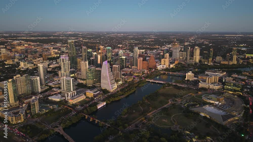 Wide aerial view overlooking the downtown Austin cityscape, sunset in TX, USA Wide aerial view overlooking the downtown Austin cityscape, sunset in TX, USA