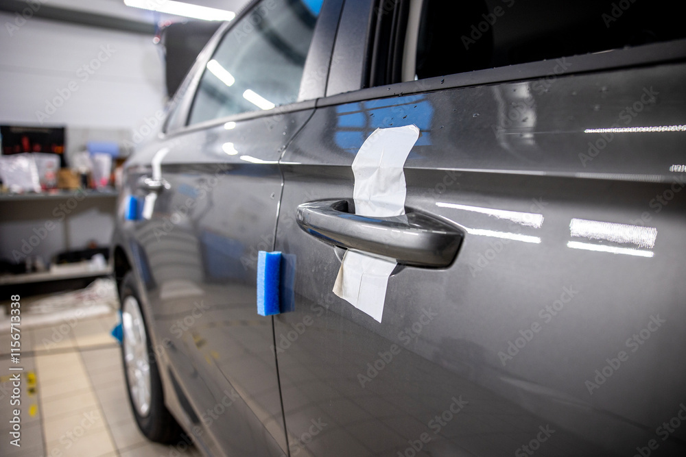 Naklejka premium new car in car service for installation of additional equipment