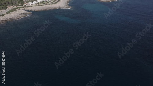 Wallpaper Mural Biniancolla vacation village in the island of Menorca Spain Mediterranean sea, Aerial tilt up reveal shot Torontodigital.ca