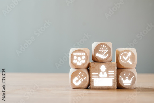 Wooden blocks with icons representing employer branding, showcasing modern workplace culture and recruitment strategies.