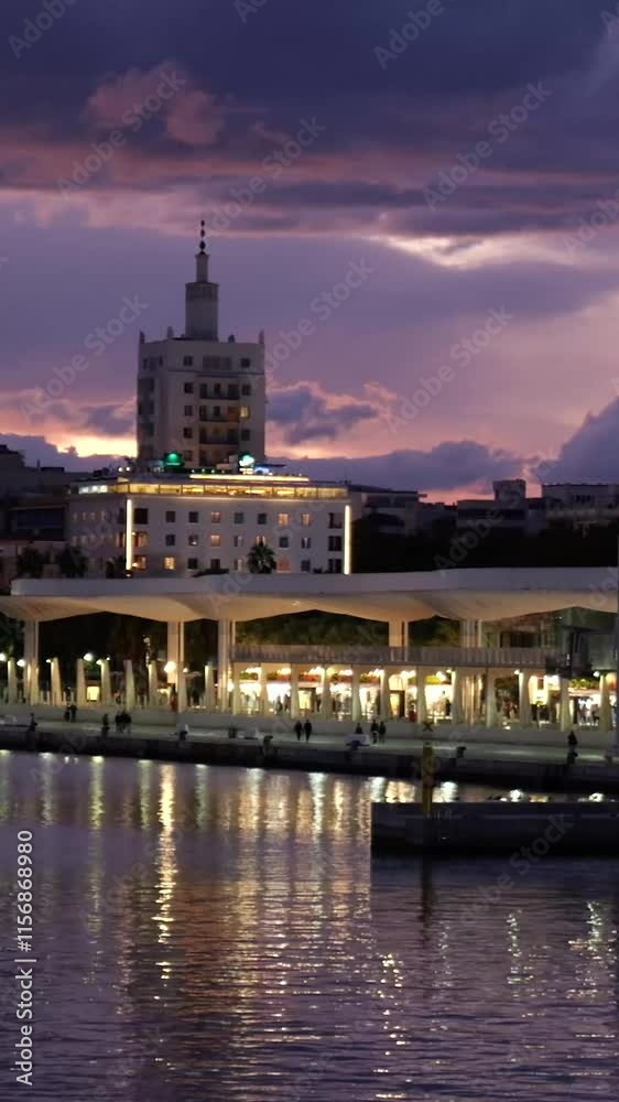 port malaga reveals clouds city skyline illuminated by evening light creating visual panning shot dramatic beauty experience tourists scenic relaxation energy adventure excitement port malaga reveals clouds city skyline illuminated by evening light creating visual panning shot dramatic beauty experience tourists scenic relaxation energy adventure excitement