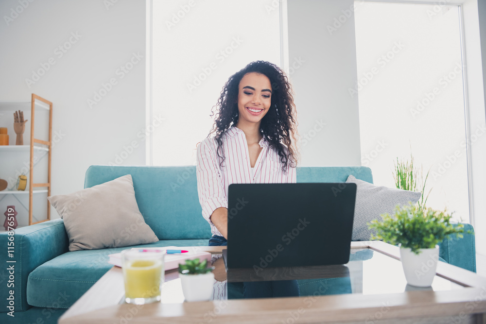 Portrait of pretty young girl use laptop table wear striped shirt white interior modern flat indoors