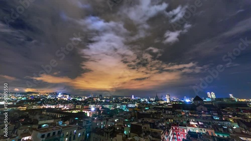 Wallpaper Mural BARCELONA, SPAIN - NOVEMBER 9, 2024: Stunning night skyline of Barcelona illuminated by city lights and clouds above Torontodigital.ca