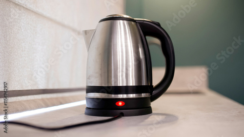 Electric kettle on a modern kitchen counter. Concept: blending technology and convenience, offering a fast and efficient way to boil water for everyday needs. photo