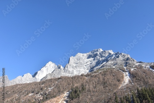 Four Girls Mountain or Siguniangshan as know as Switzerland travel location of China with sky background photo