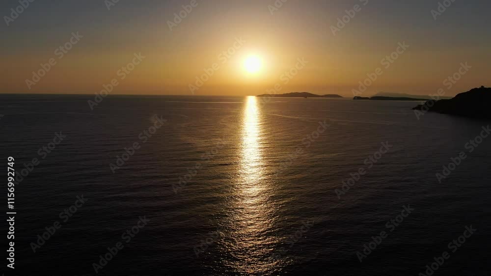 Golden sunset over calm ocean,corfu greece Golden sunset over calm ocean,corfu greece