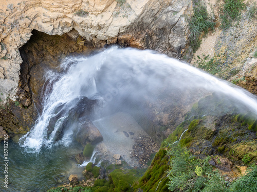 Water jump of Arquillo Reservoir near San Blas, Teruel photo