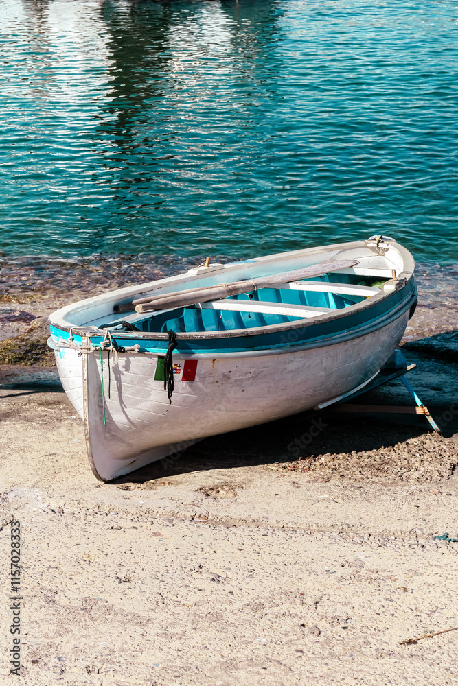 Empty boat with Italian flag in the harbor of Capri island, Italy. Empty boat with Italian flag in the harbor of Capri island, Italy.