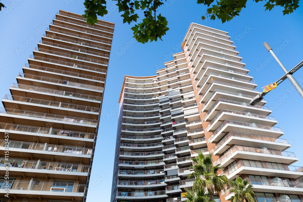 Modern residential buildings reaching for the sky in barcelona, spain