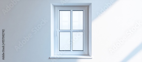 Modern white plastic window with clear glass and elegant frame against a clean white wall ideal for interior design and renovation concepts