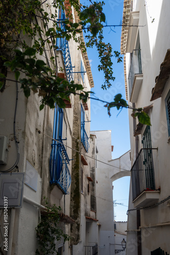 Fototapeta Naklejka Na Ścianę i Meble -  White old houses and narrow streets in medieval small touristic coastal town Sperlonga, Latina, vacation in Italy