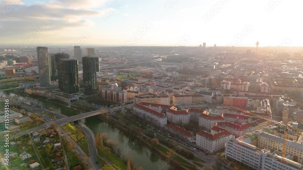 Vienna, Austria Aerial View: Sunset Over City Center and Canal. Top cinematic aerial view. 4K drone footage Vienna, Austria Aerial View: Sunset Over City Center and Canal. Top cinematic aerial view. 4K drone footage