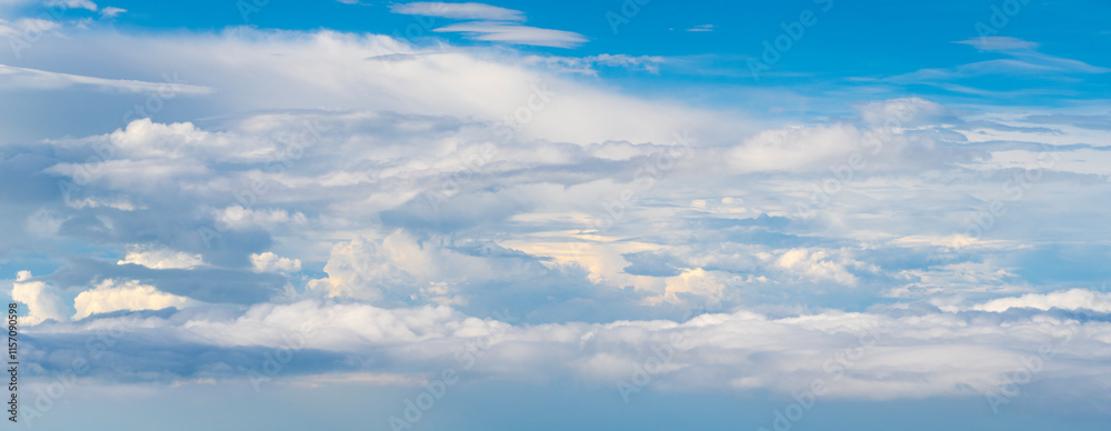 Blue Sky with Fluffy White Clouds on a Sunny Summer Day. Cloudscape - Blue sky and white clouds. Background cloud summer. Sky cloud clear with sunset. Natural sky