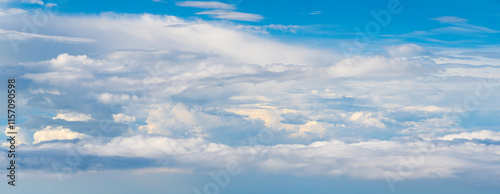 Obraz na płótnie Blue Sky with Fluffy White Clouds on a Sunny Summer Day. Cloudscape - Blue sky and white clouds. Background cloud summer. Sky cloud clear with sunset. Natural sky w salonie
