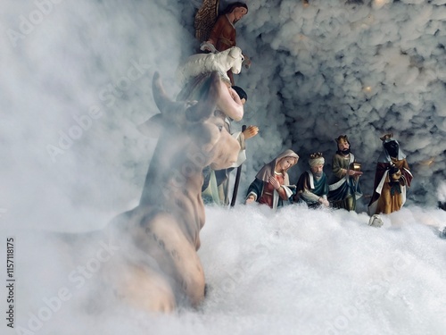 Nativity scene with family in Winter. Christmas decoration in church at India.