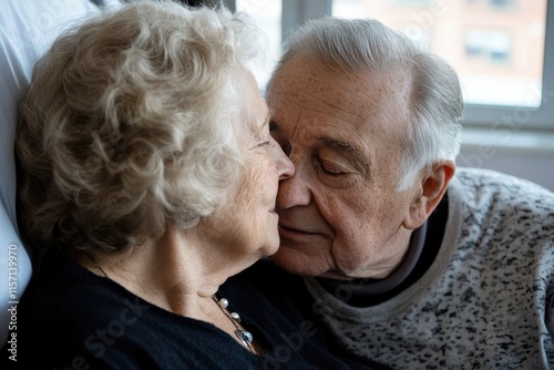 An affectionate encounter between an elderly couple, showcasing the love and abiding care they have for each other in their twilight years.