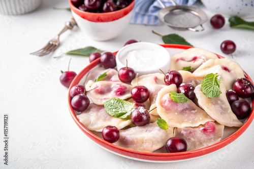 Traditional West Europe cherry pierogi dumplings photo