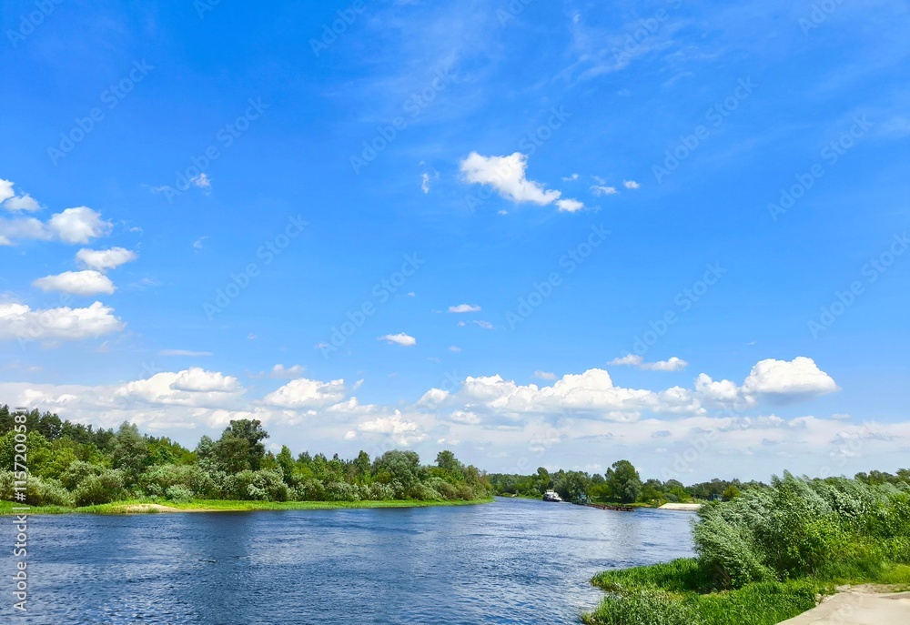 Serene landscape with fluffy clouds over a calm river surrounded by lush greenery. Beautiful summer landscape river surrounded by green vegetation Serene landscape with fluffy clouds over a calm river surrounded by lush greenery. Beautiful summer landscape river surrounded by green vegetation