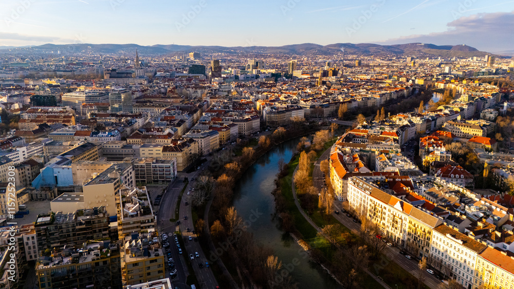 Vienna, Austria Aerial View: Sunset Over City Center and Canal. Top cinematic aerial view. Vienna, Austria Aerial View: Sunset Over City Center and Canal. Top cinematic aerial view.