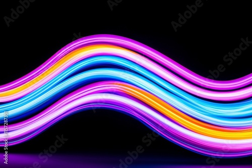In long exposure light painting photography, a curving swirl of vivid neon pink and shiny yellow gold stands out against a black background.