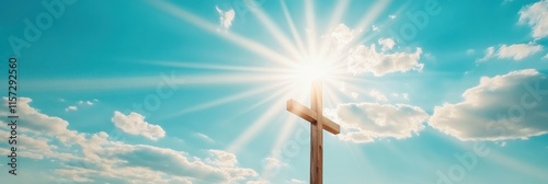 A radiant cross shines against a vibrant blue sky, symbolizing resurrection and hope during Easter, with sun rays illuminating the scene, enhancing feelings of renewal and divine inspiration