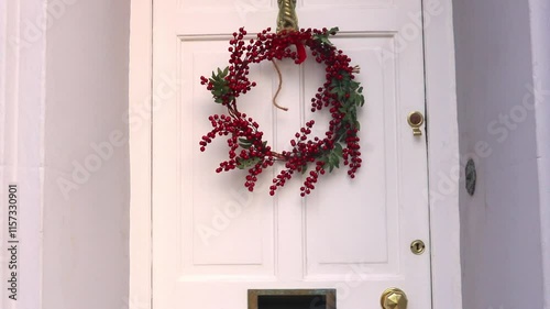 Closing White Front Door Home Christmas Wreath Berries Festive Holiday Season 