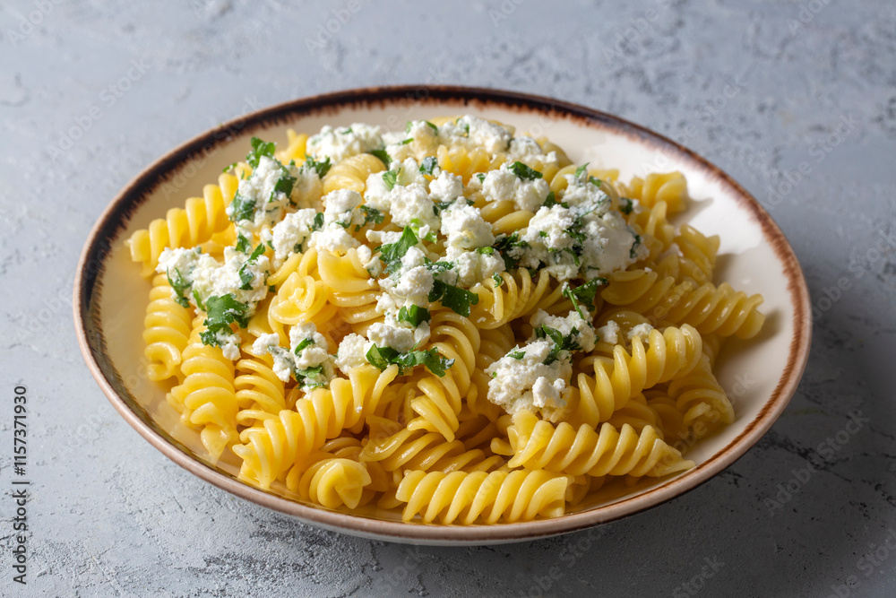 The cheese fusilli pasta is delicious. Turkish name; Peynirli makarna