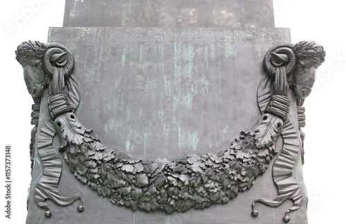 historical architave block with metal ornament, sheep heads and garland with  leaves