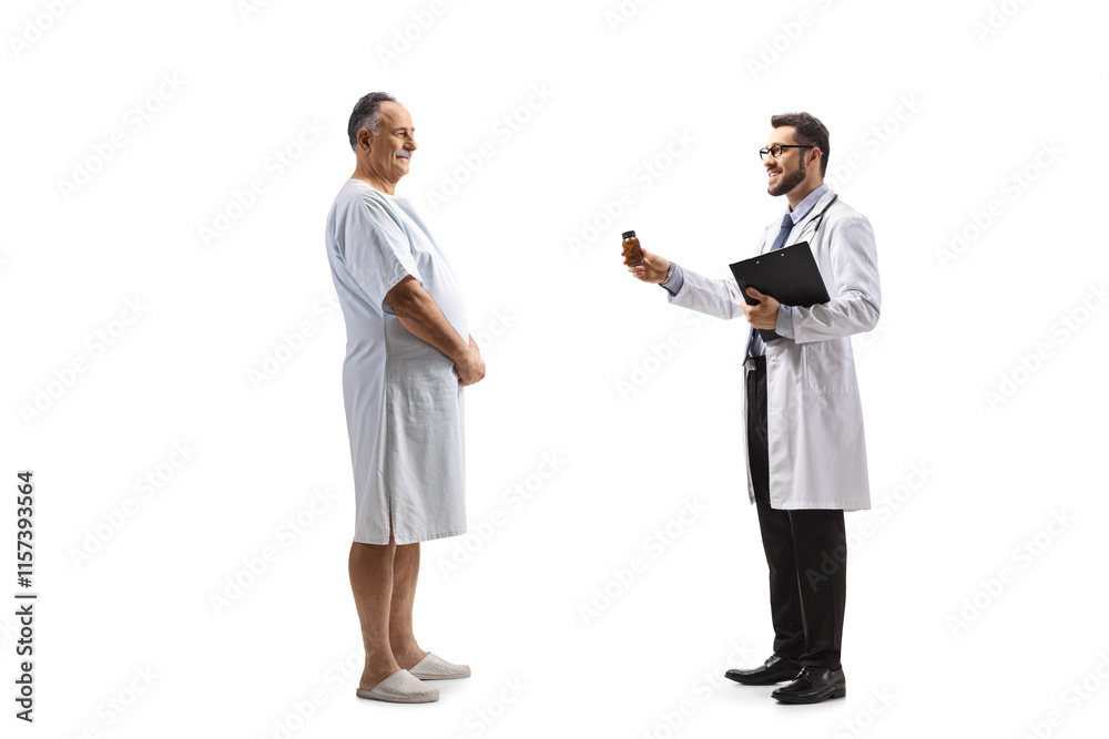 Doctor giving a bottle of pills to a mature male patient Doctor giving a bottle of pills to a mature male patient