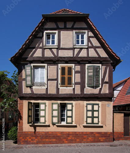 A vacant half-timbered baroque residential house in the old town of Kandel, Germany, in decay photo