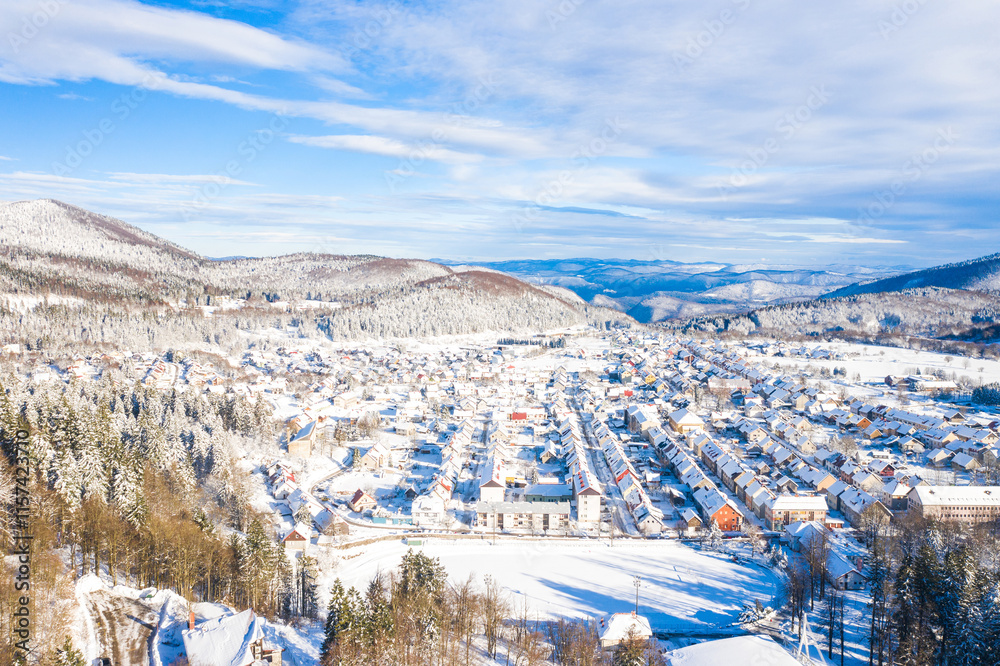 Drone aerial view of the town of Delnice in Gorski kotar in winter under snow, Croatia Drone aerial view of the town of Delnice in Gorski kotar in winter under snow, Croatia