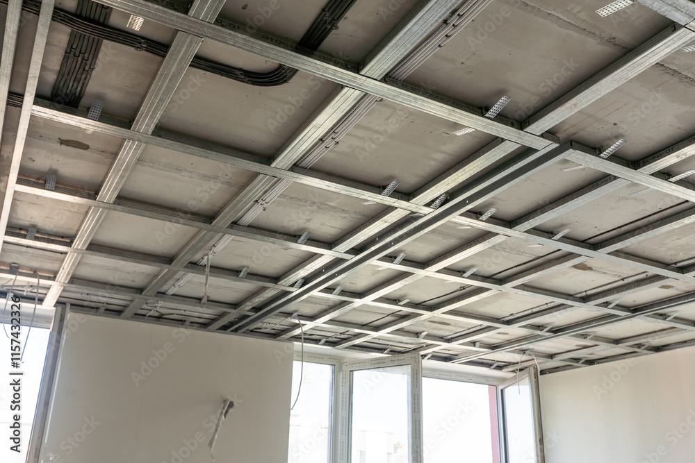 The metal frame of the ceiling, sound insulation, in the process of repairing an apartment The metal frame of the ceiling, sound insulation, in the process of repairing an apartment