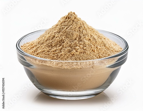 Glass bowl of mixed bran flour isolated on white