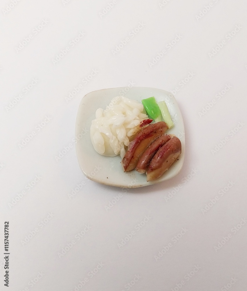 miniature cute handmade clay isolated sculpture food rice grilled meat
miniature cute handmade clay isolated sculpture food rice grilled meat