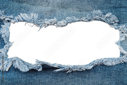 Hole in denim on a white background. Ripped jeans