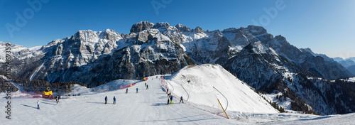 Pinzolo, Italy. Amazing view of the ski resort and Dolomites from Doss del Sabion at 2100 MT