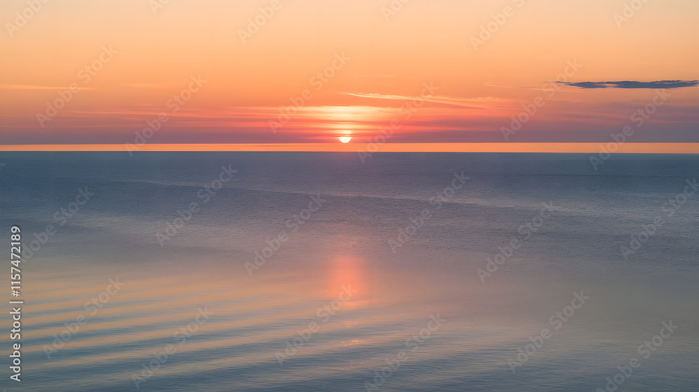 A photo of the sunrise over the sea. The sky is painted with warm hues of orange and pink. A photo of the sunrise over the sea. The sky is painted with warm hues of orange and pink.