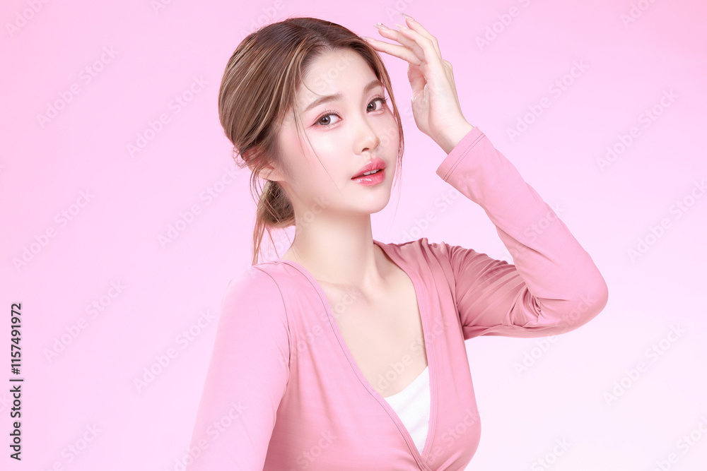 Portrait of a Smiling Asian Woman fresh skin in Stylish Pink Attire Against a Soft Background. Portrait of a Smiling Asian Woman fresh skin in Stylish Pink Attire Against a Soft Background.