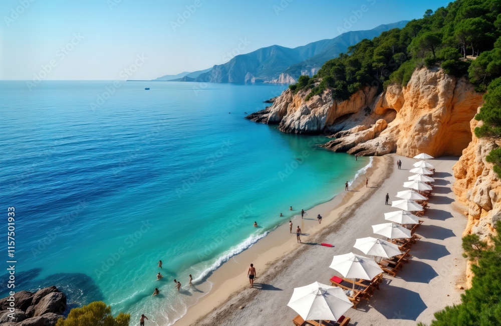 Obraz premium Turquoise water lagoon beach in Antalya region of Turkey. Tourists enjoy sun, sand on vacation. White umbrellas, sunbeds situated on shore. Scenic view of coastline with rocks, mountains. Calm,