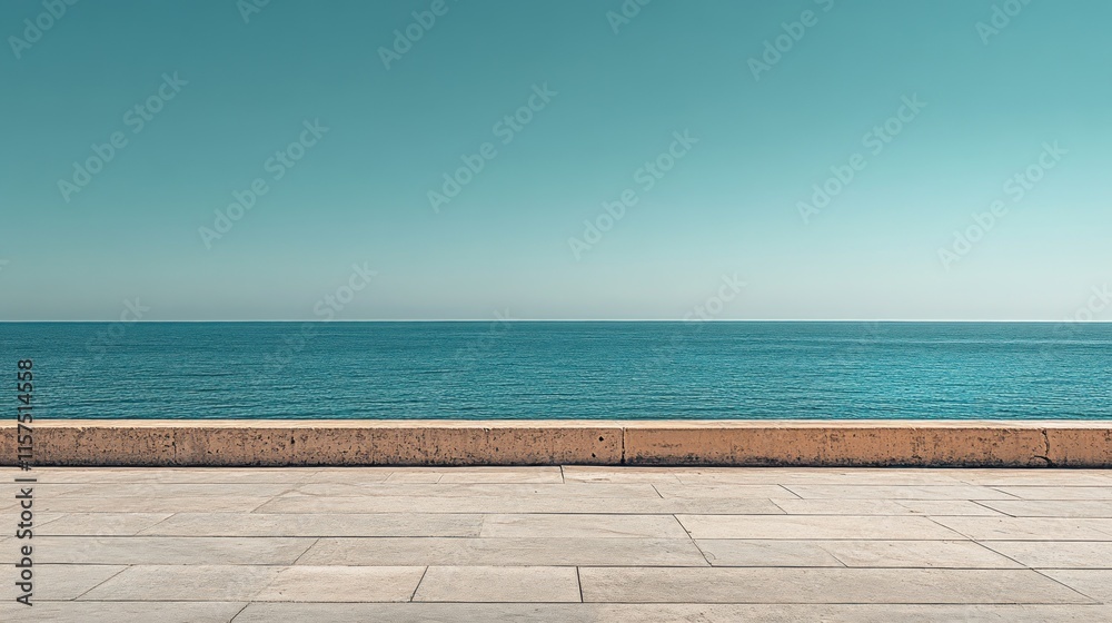 Fototapeta premium vast, empty concrete expanse stretching into the distance under a serene, cloudless blue sky.