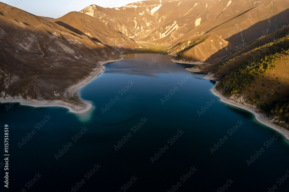Obraz premium Beautiful aerial view of a mountain lake in a picturesque gorge. Landscape and nature of the North Caucasus