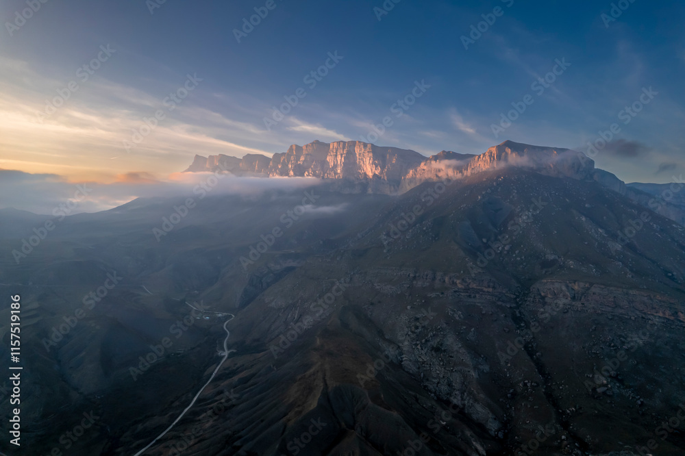 Fototapeta premium Mountains in the clouds. Low clouds in the North Caucasus mountains