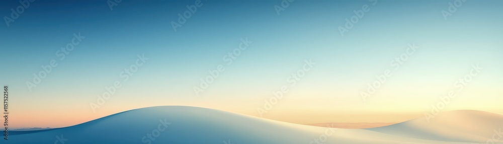 Fototapeta premium Tranquil landscape featuring soft hills under a serene sky.