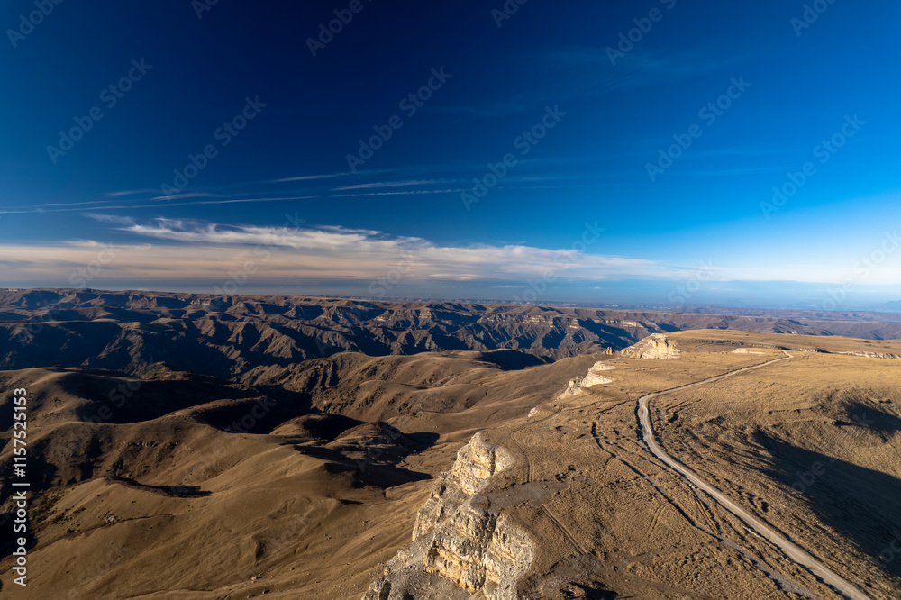 Obraz premium Beautiful aerial view of a mountain plateau with high cliffs. Landscape and nature of the North Caucasus