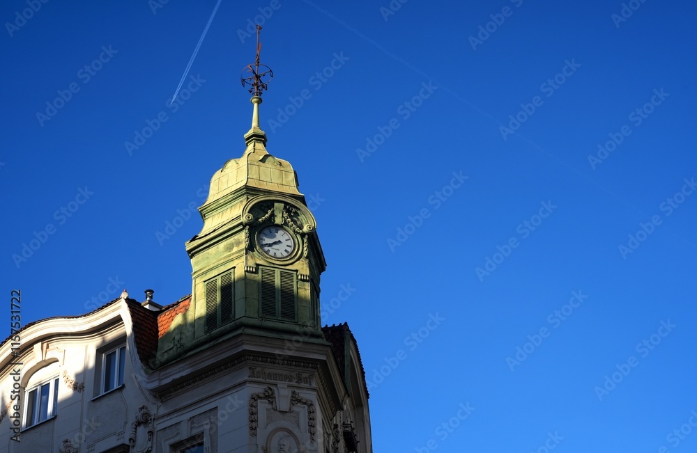 Historic Clock Tower Against a Clear Blue Sky Historic Clock Tower Against a Clear Blue Sky