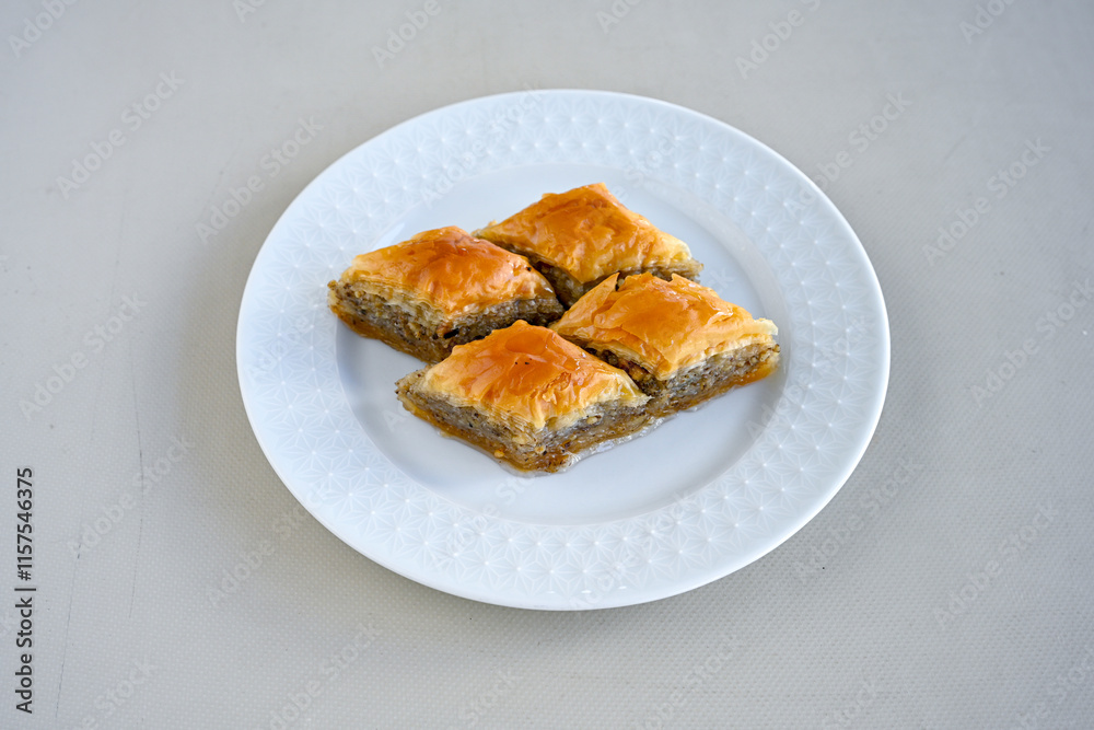 Turkish Dessert Sobiyet, havuc dilimi, midye baklava, mussels baklava and classic baklava with Pistachio . Cikolatali cevizli, fistikli soguk Baklava, top view. Turkish Dessert Sobiyet, havuc dilimi, midye baklava, mussels baklava and classic baklava with Pistachio . Cikolatali cevizli, fistikli soguk Baklava, top view.