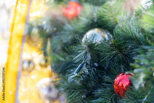 Christmas decoration with christmas balls and green branches. festive background